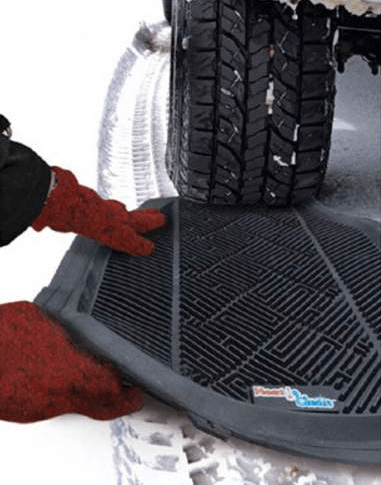 Use car mats for traction

If your wheels are sticking in the snow and you can’t rock or drive out, go ahead and use your car mats.  They’ll give your tires something to grip onto so they can move.