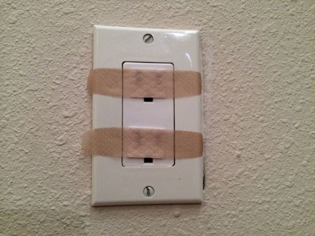 You can also MacGyver your own outlet covers with Band-Aids.