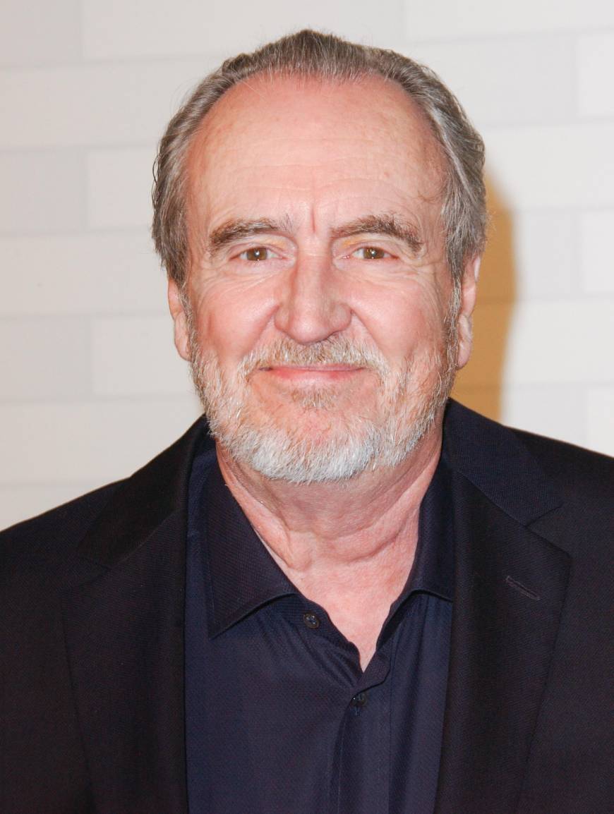 August 30, 2015: Legendary horror movie writer/director Wes Craven passed away from brain cancer at the age of 76. Craven, who is best known as the man behind five Nightmare on Elm Street films, also created the Scream series and helmed other beloved horror flicks like The Hills Have Eyes. 

A blue-collar kid, Craven said he got the idea for Elm Street from living next to a cemetery in his home town of Cleveland, but his legacy goes beyond just terrifying audiences with his movies. Craven also gave a number of now-famous A-listers their start. He discovered Johnny Depp while casting Elm Street, gave Bruce Willis his first featured role, and made Sharon Stone a star in Deadly Blessing.  At the time of his death, he had an overall deal with Universal Cable Productions and was working on a number of projects for SyFy. He was also executive producing MTV's Scream series based on his films.