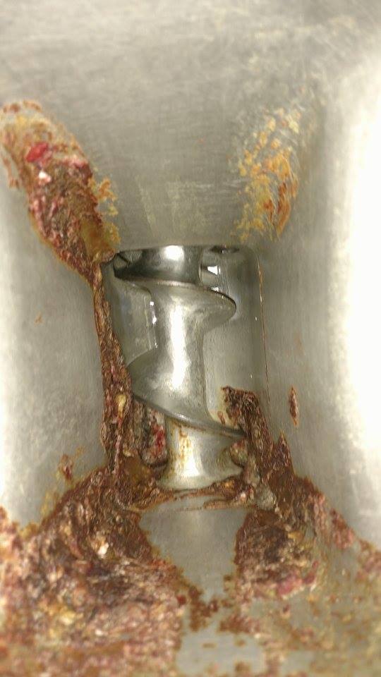 This grocery store meat grinder hasn't been cleaned in weeks