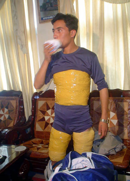This man was detailed by Afghan customs with approximately 15.2lbs (7kg) of heroin taped to his body as he tried to leave the country at Kabul Airport, Afghanistan in June 2007