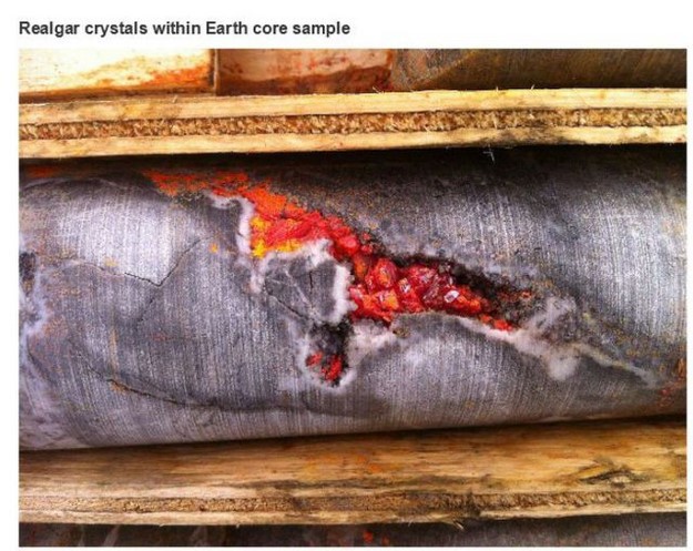 Realgar crystals within Earth core sample