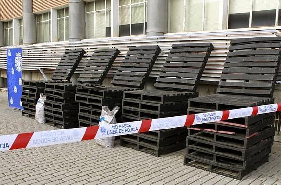 Shipping pallets made of compressed cocaine. Recently seized by authorities in Spain.