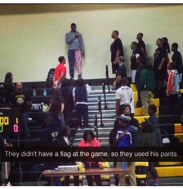 they didn t have a flag so they used his pants - 001 They didn't have a flag at the game, so they used his pants.