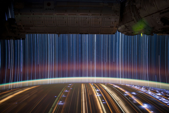 Don Pettit takes these 10-15 minute exposures while aboard the International Space Station. The auroras, lightning, city lights, and the star trails all combine for an incredible spectacle.