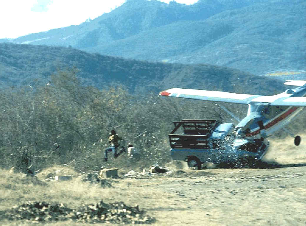 Due to strong crosswinds, a landing plane crashes with a truck standing near the runway, 1976