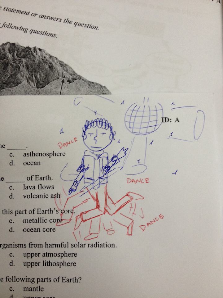 Teacher Completes Drawings Left On Students Assignments