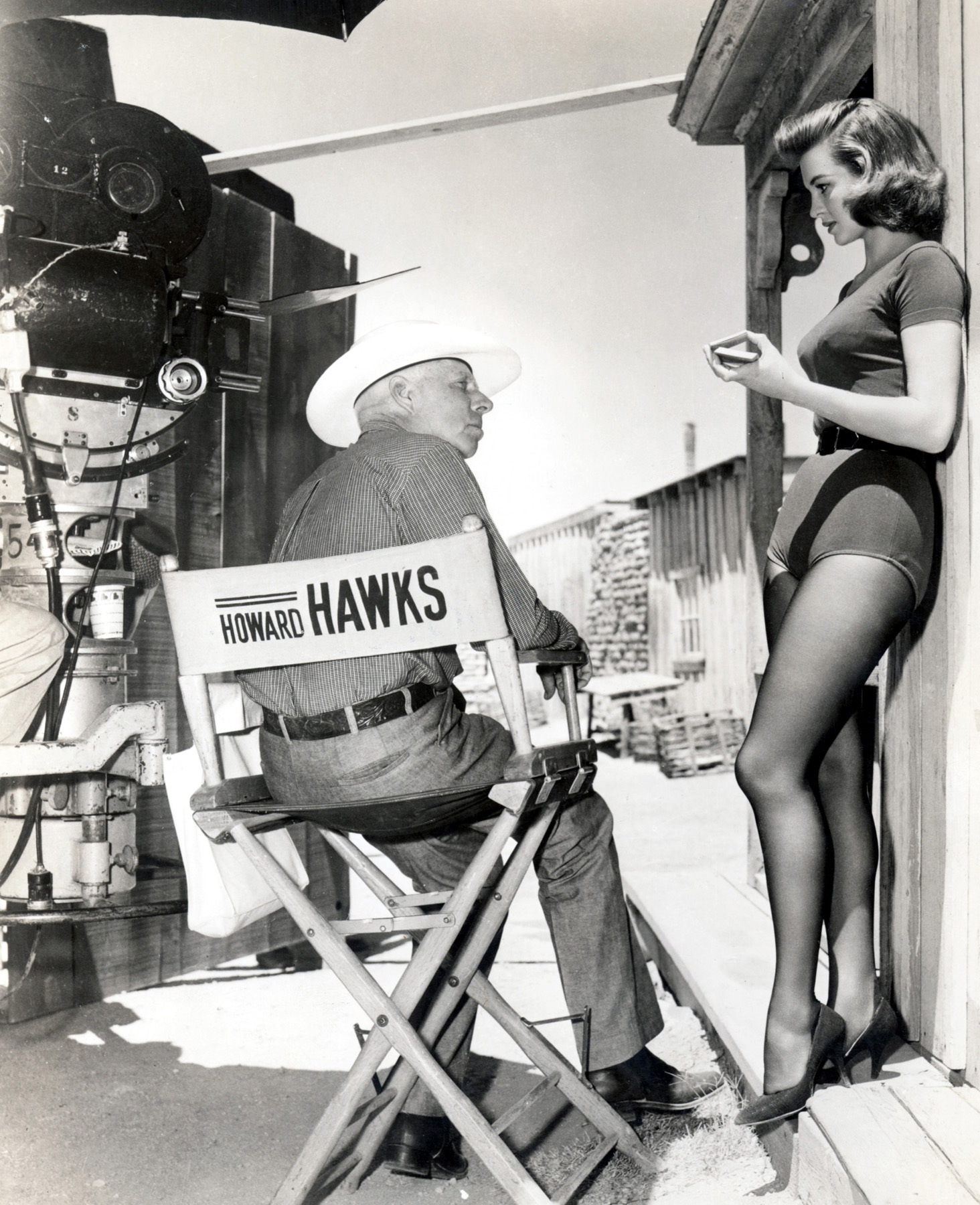 Angie Dickinson and Howard Hawks on the set of Rio Bravo, 1959.