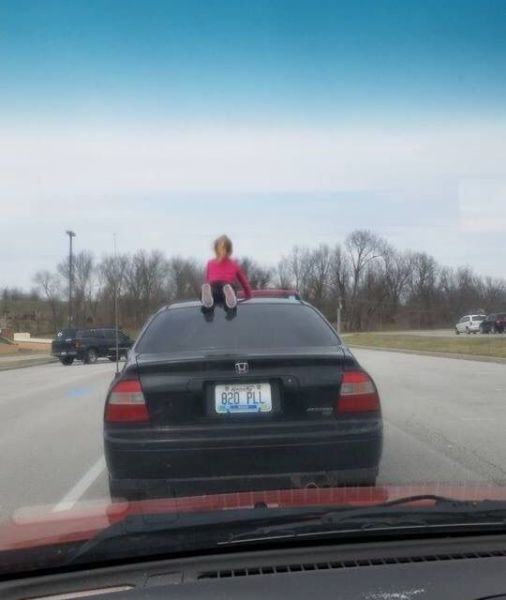 child on car roof