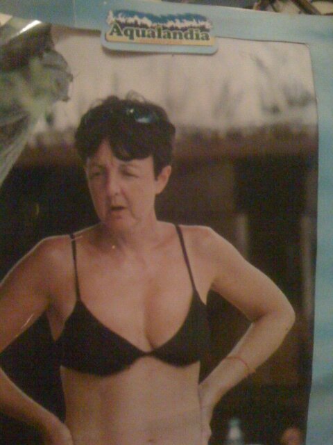Paul McCartney at the beach in a bikini.