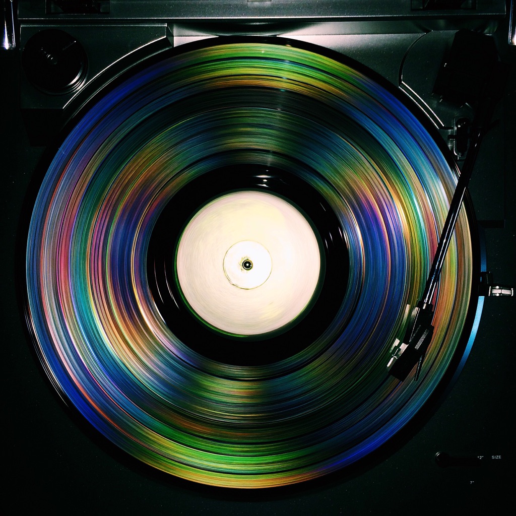 Taking a picture of a vinyl record spinning with the flash on. The outcome was amazing.
