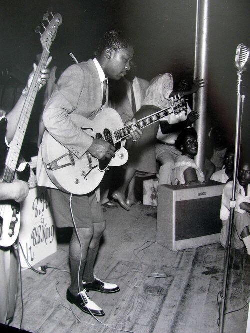 B.B. King, in his 20s, Plays one of the first Lucilles. (1950s)