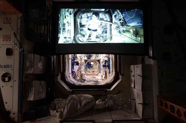 The International Space Station just got a new projector screen. They're using it to watch the film "Gravity".