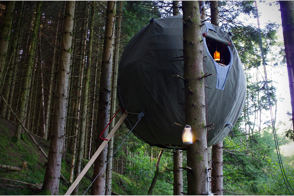 Luminair Tree Tent - Think of the structure as a semi-permanent tree house. Thanks to a hybrid aluminum and steam-bent ash frame, the entire tent, including floor and bunks, weighs just 264 lbs., despite being able to handle an additional 550 lbs. of load. 10,000 Dollars