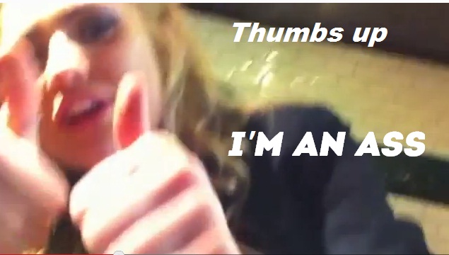 Photo from her Video, of her sticking her fingers up...