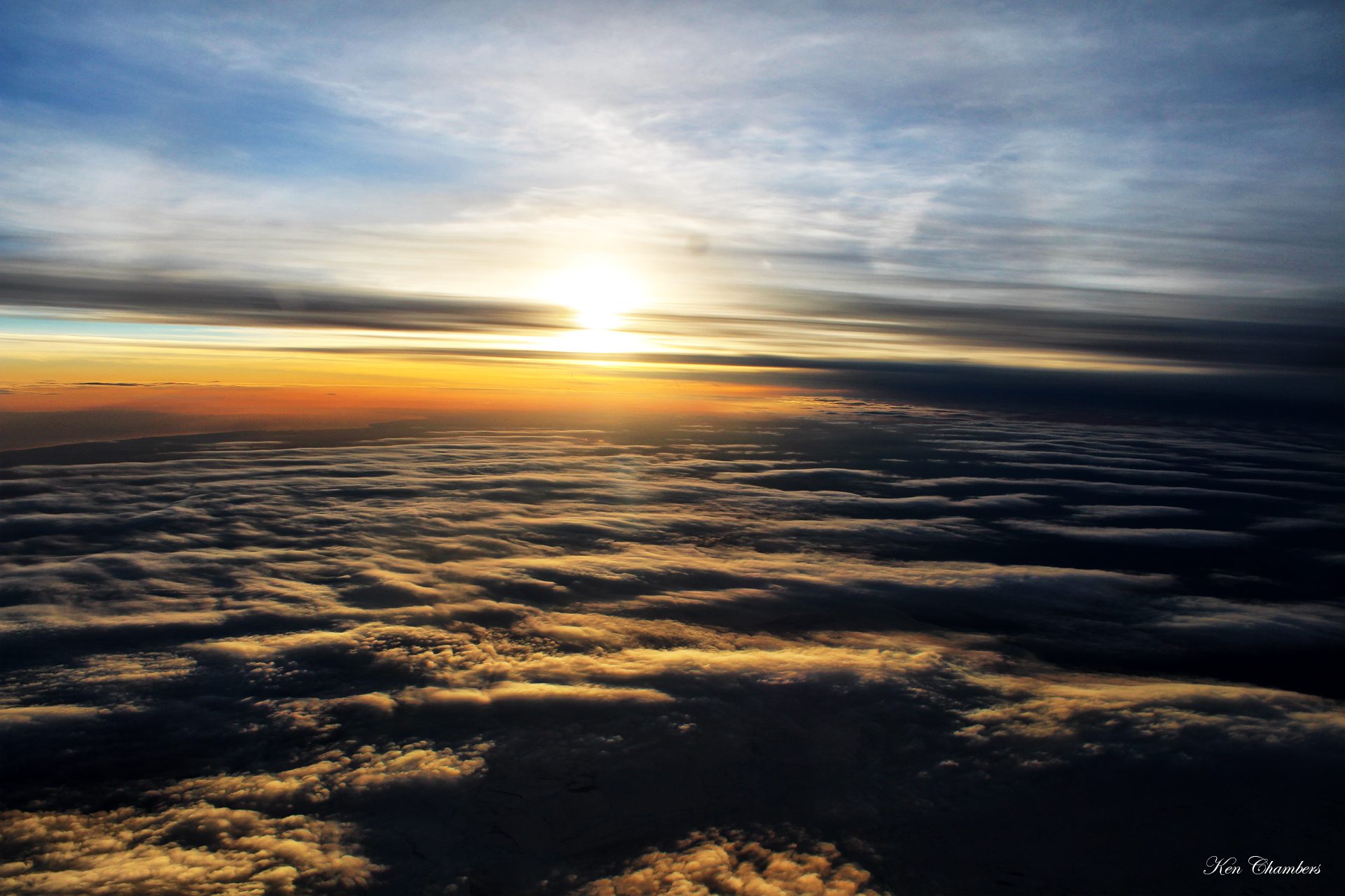 Taken on a plane taking off during sunrise