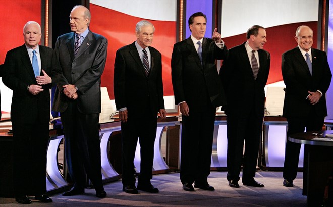 Republican presidential hopefuls McCain, former Sen. Fred Thompson, Rep. Ron Paul, former Massachusetts Gov. Mitt Romney, former Arkansas Gov. Mike Huckabee and former New York City Mayor Rudy Giuliani participate in a televised debate on Jan. 5, 2008 in Manchester, New Hampshire.