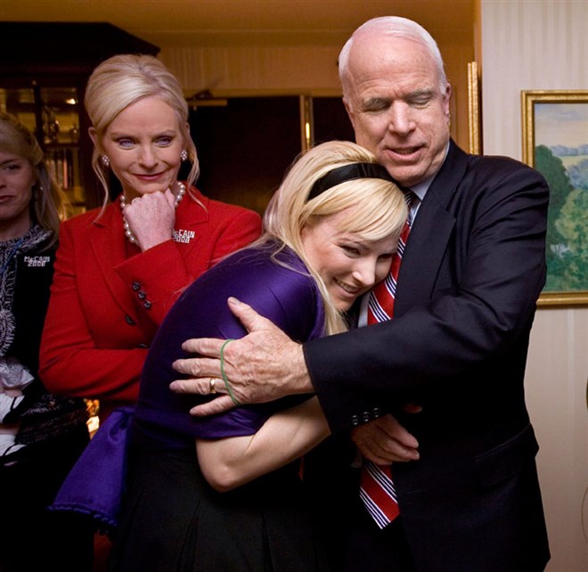 McCain hugs his daughter Meghan after hearing that he was the projected winner of the New Hampshire Primary on Jan. 8, 2008.