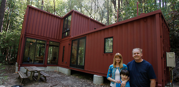 shipping container house in the woods