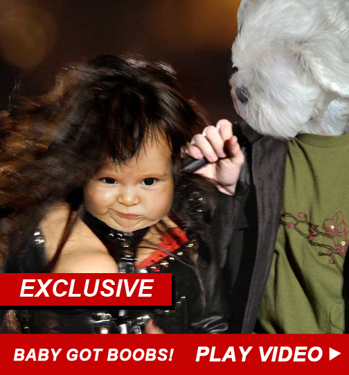 It's a baby with a boob and a dog with a microphone.