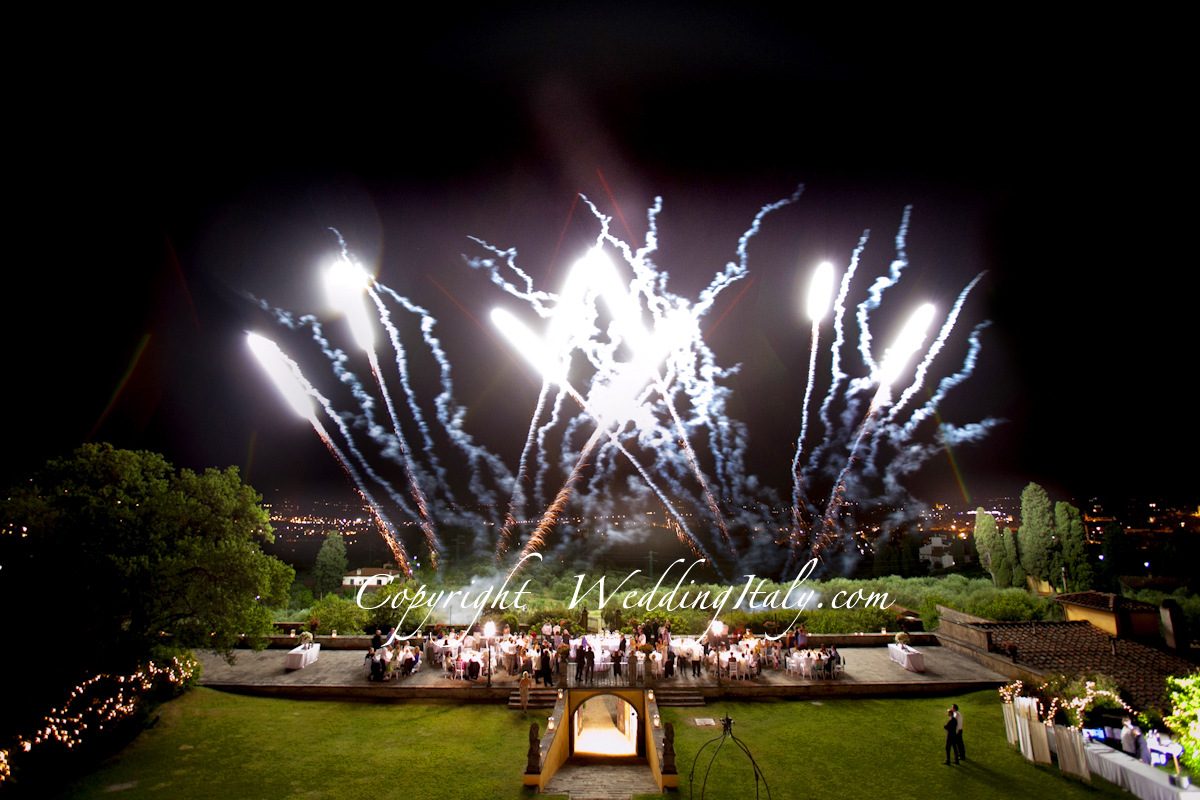A special Italian wedding party ending with fire works. Watch more at http://www.weddingitaly.com