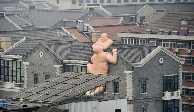 Two Naked 50ft Statues Of Buddha