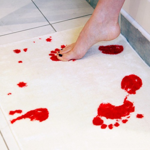 Bloody bath mat, also has a matching shower curtain.