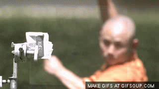 Monk throwing a needle through glass