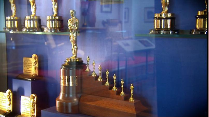 The custom Academy Award granted to Snow White and the Seven Dwarfs consisted of one regular sized award and seven smaller sized awards.