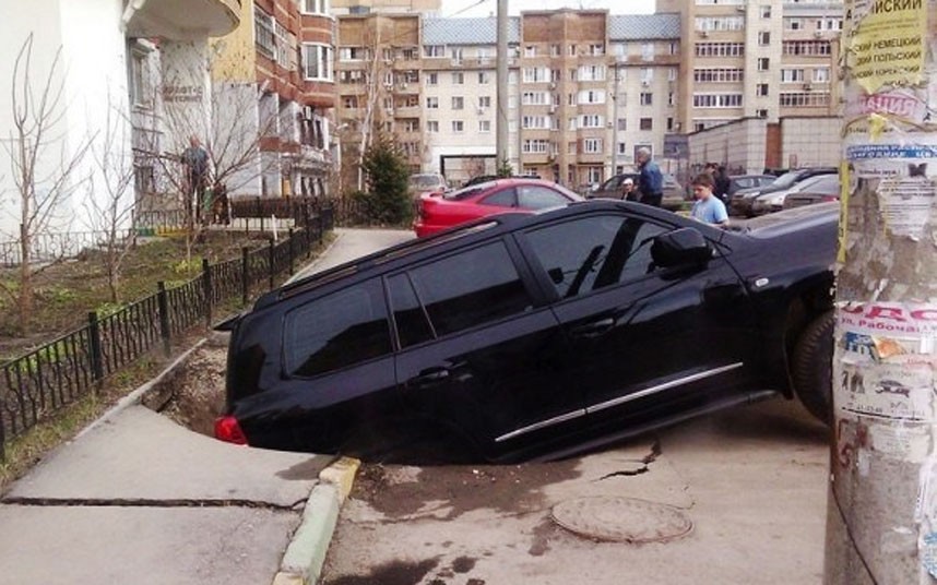 A Russian City Is Being Swallowed by Giant Sinkholes!