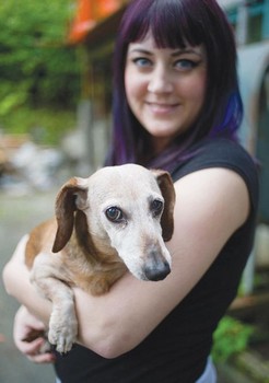 22 year old Brooke Collins saved her dog from being eaten by a bear... BY PUNCHING IT IN THE FACE. She didn't see the bear outside when she let Fudge out to play. When he darted out the door barking insanely, she looked across the yard and saw him being picked up and bitten in the neck by a bear... Fudge only sustained minor injuries.