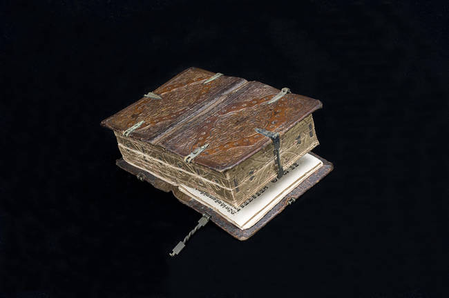 This Tiny, Old Book Can Do Something...