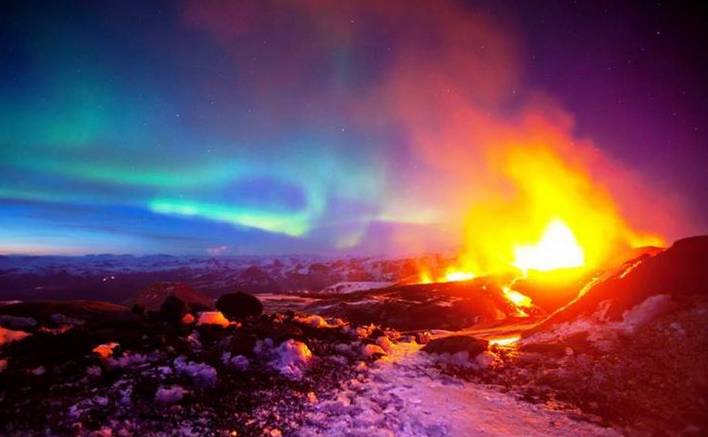 The Aurora Borealis and a volcanic eruption at the same time.