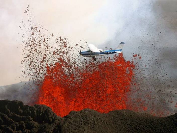 An aerial photo of a volcano erupting...the plane was far enough away, but it sure looks scary.