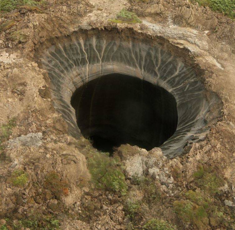 A giant hole found by reindeer herders. No one knows how this appeared.