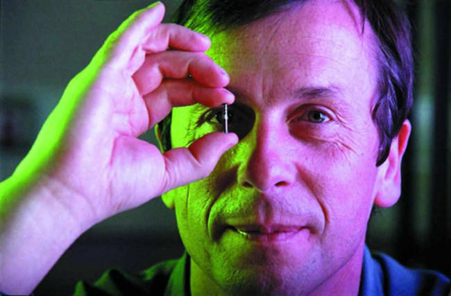 Kevin Warwick is a cybernetics professor at the University of Reading. He installed a chip in his own arm that allows him to control lights, doors, heaters, and even other computers.