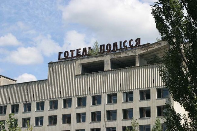 Entering the outlying city of Pripyat, you're greeted by one of its many former hotels.