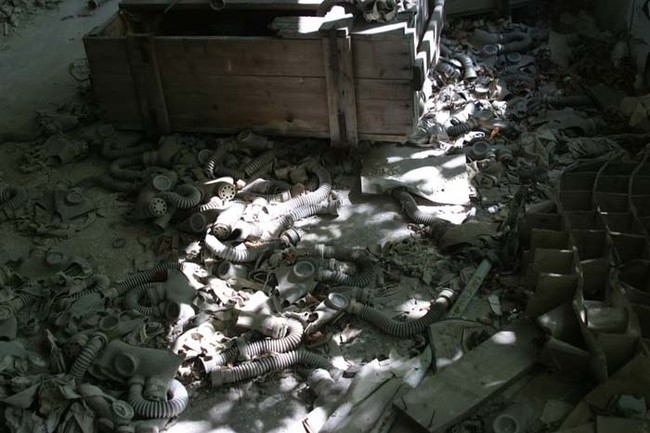 This is a box of gas masks found inside the school. From the looks of it, the box was quickly opened while rushing to get the children out.