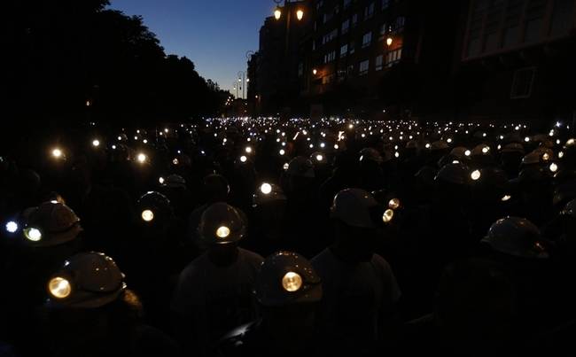 Miners of Spain conduct a night protest.