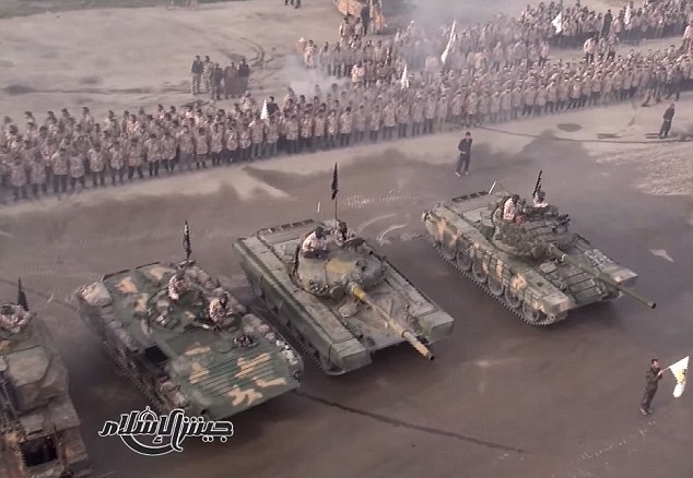 Jaysh-Al-Islam, which translates to “Army of Islam” – (not to be confused with the terrorist organisation located in Gaza Strip) – are a militant group opposing ISIS and the Syrian regime and this graduation video of over 1,700 troops and a fleet of armoured tanks is a strikingly impressive military parade. There are said to be as many as 25,000 loyal fighters for this cause after 60 rebel factions in Syria merged, knowing the strength was in numbers.
This has been deemed the “largest military parade” since the dawn of the Syrian revolution in 2011.