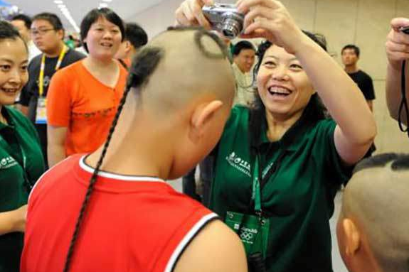 China: Butch Brides. A survey reports that 75% of men notice women initially because of their hair but if you’re born in some parts of China, the last time you’ll see your bride with a full head of hair is the night before your wedding. After that, a married woman is supposed to shave it off as a sign of beauty and cleanliness. Brave.