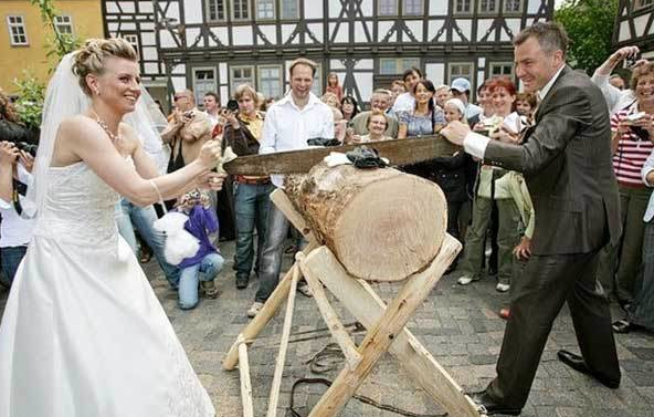 Germany: Log cutting. Newlyweds must put their bond as a couple to the test by working together to saw a huge log in half in front of guests. The act is supposed to represent the teamwork they’ll have throughout marriage. Also, their ability to light a good fire if the time comes.