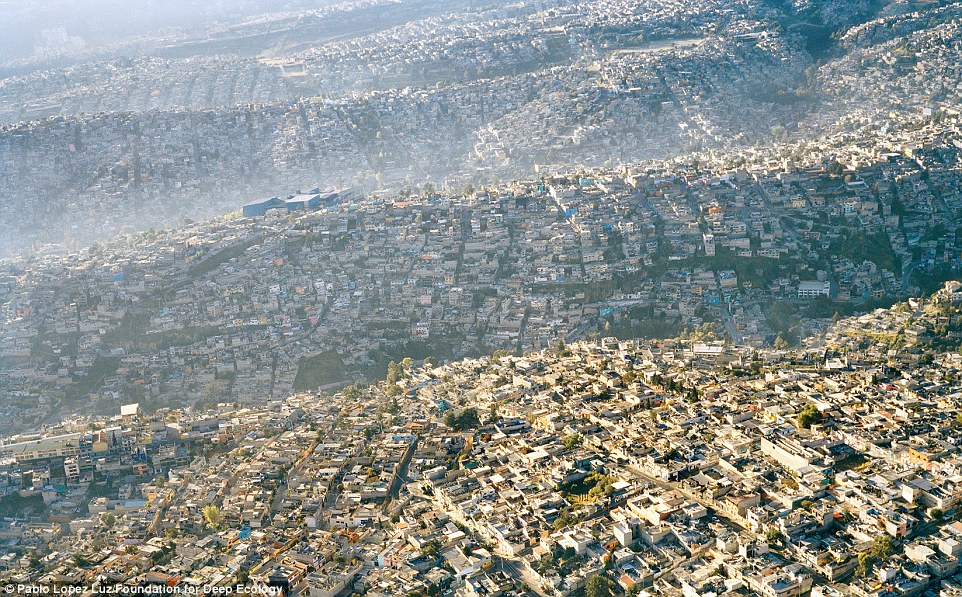 Mexico city, population 20 million, sprawls over hills and landscapes destroying any nature in its path.