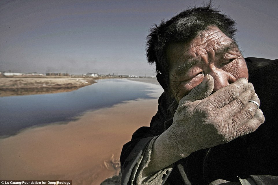 A farmer by the yellow river in China can not stand the smell.