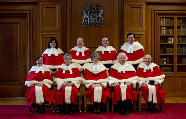 The uniforms for the Canadian Supreme Court makes the judges look like Santa Clauses in training