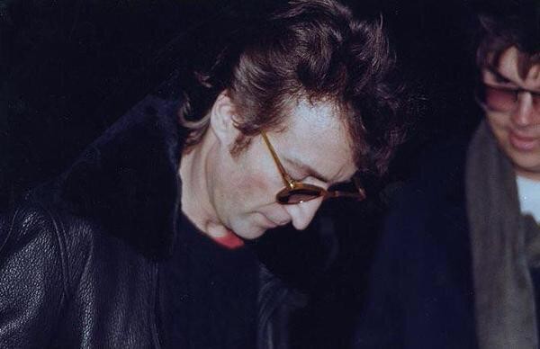 The last person to be photographed with John Lennon was Mark David Chapman... who was also his killer.