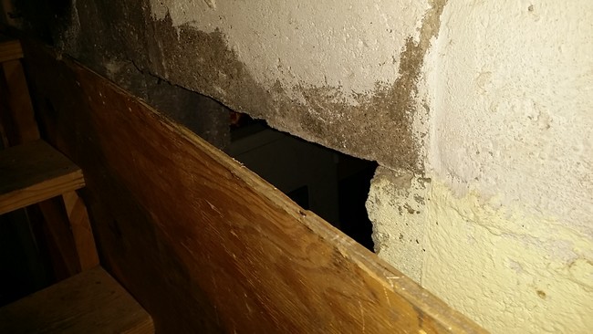 He quickly figured out that this piece of wood was hiding a secret room.