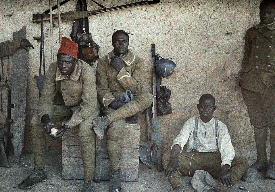 16th June, 1917, France – Senegalese soldiers serving as infantrymen in the French Army are resting in a room surrounded by weapons in Saint-Ulrich: