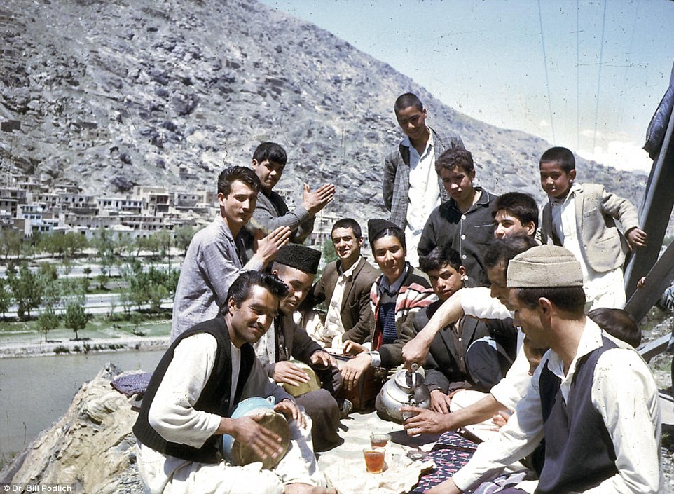 Boys chill out outside the American International School of Kabul