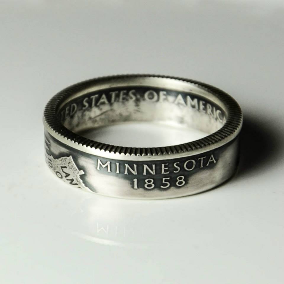 Designer Drills Holes Into Coins Turning Them Into Rings
